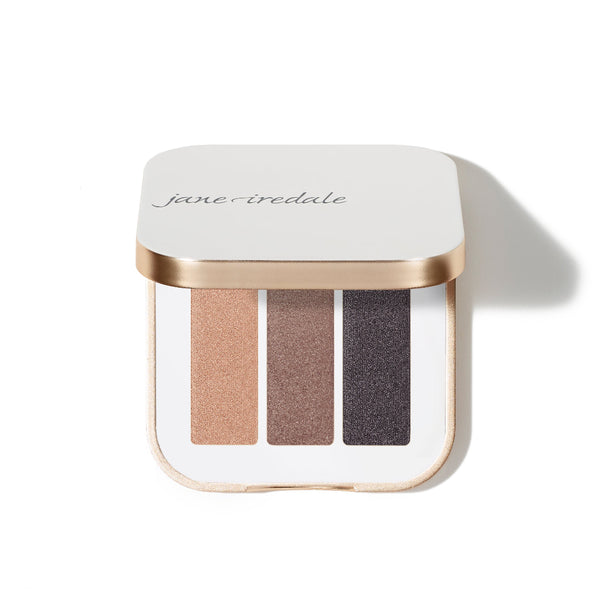 Eye shadow palette with three colors in a compact case on a white background