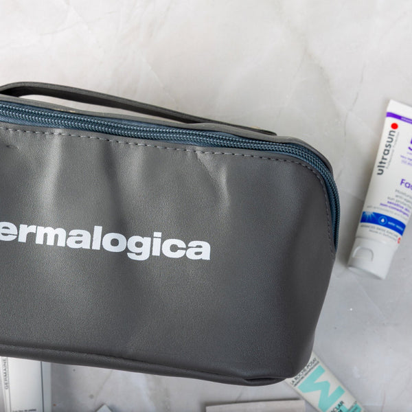 Dermalogica cosmetic bag with a tube of sunscreen on a white background