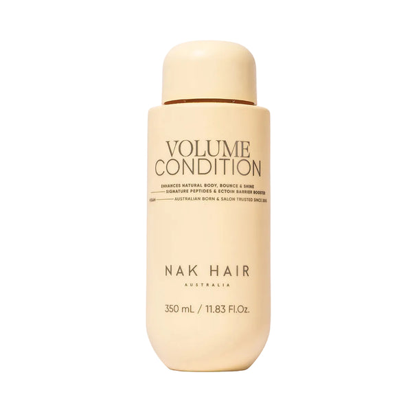 Nak Hair Volume Condition bottle on a white background