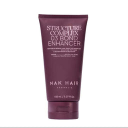 A tube of Nak Hair Structure Complex 03 Bond Enhancer in a deep plum purple color with white text, shown against a plain white background.