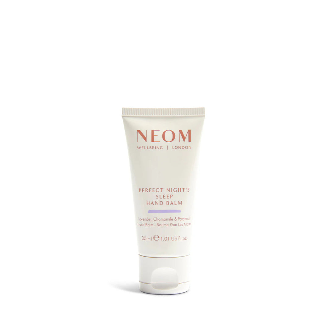 Neom hand balm tube on a white background