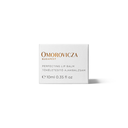 A white rectangular box of Omorovicza Perfecting Lip Balm, featuring gold and black text on a clean white background with a soft shadow.