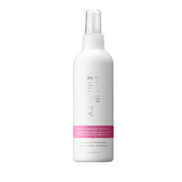 Philip Kingsley Daily Damage Defence Protective Priming Mist in a white spray bottle with a pink label band, shown on a solid white background.