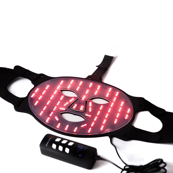 LED mask with red lights and a control device on a white background