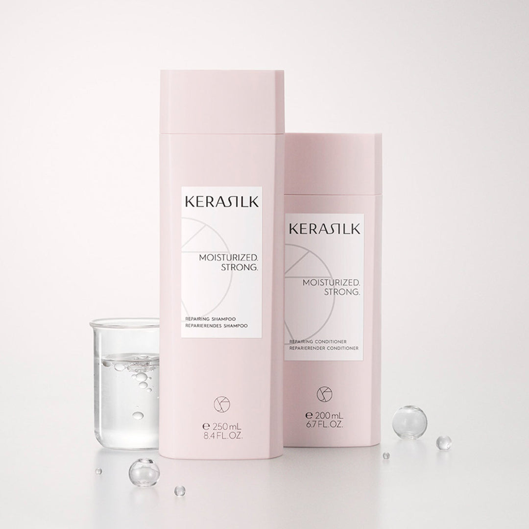 Kerasilk shampoo and conditioner bottles on a white background