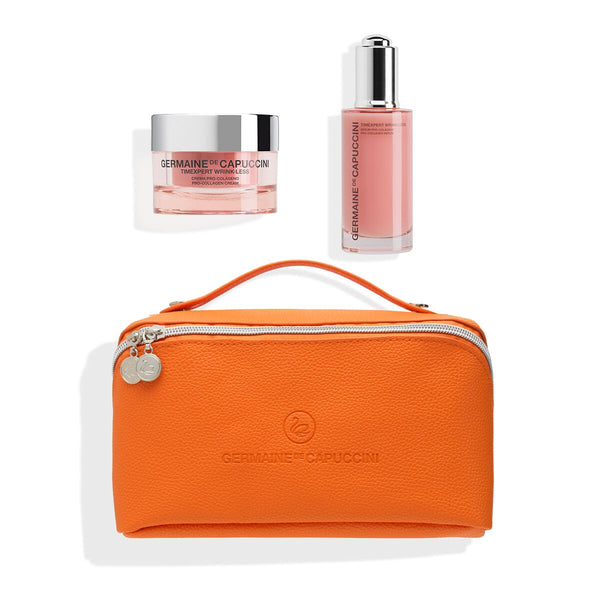 Orange cosmetic bag with two skincare products on a white background