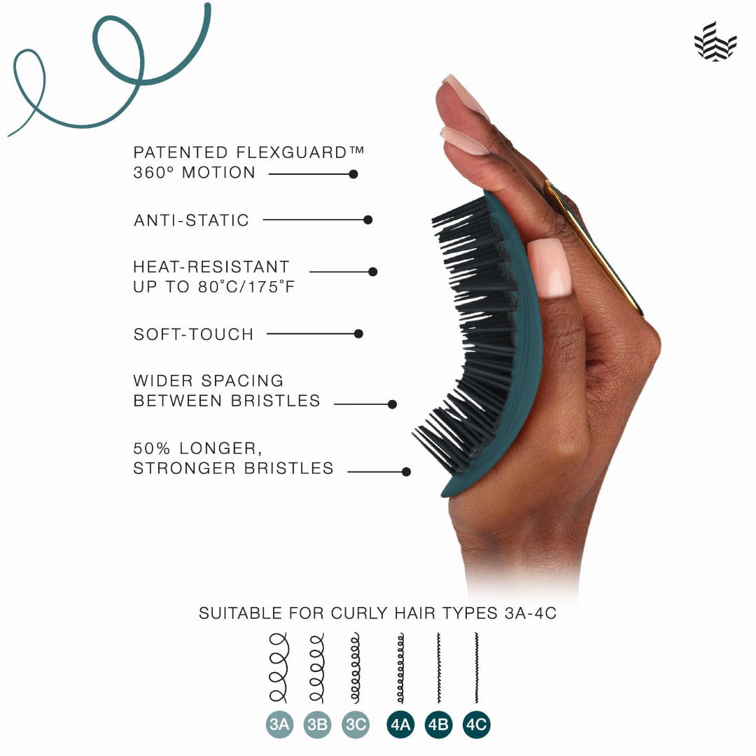 A hand holds a dark teal Flexguard hairbrush with black bristles against a white background, surrounded by feature callouts and hair type compatibility icons.