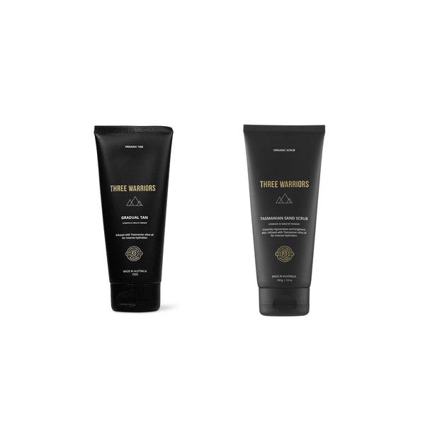 Two black squeeze tubes of Three Warriors haircare products, 'Harsh Acid Peel' and 'Hair Growth Serum', standing upright on a plain white background.