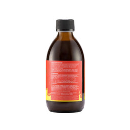 Bottle with a red label on a light beige background