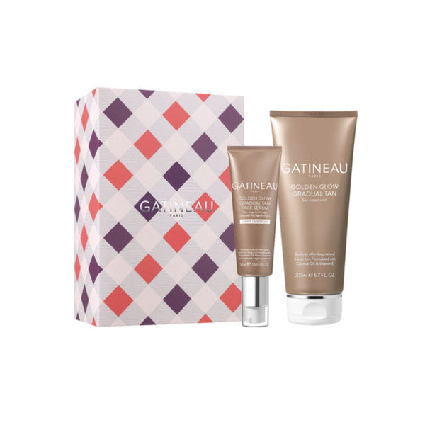 Gatineau Paris gift set featuring a patterned box with pink, purple, and orange diamonds alongside a small cosmetic tube and a larger golden glow gradual sun tube, both in a warm taupe color.