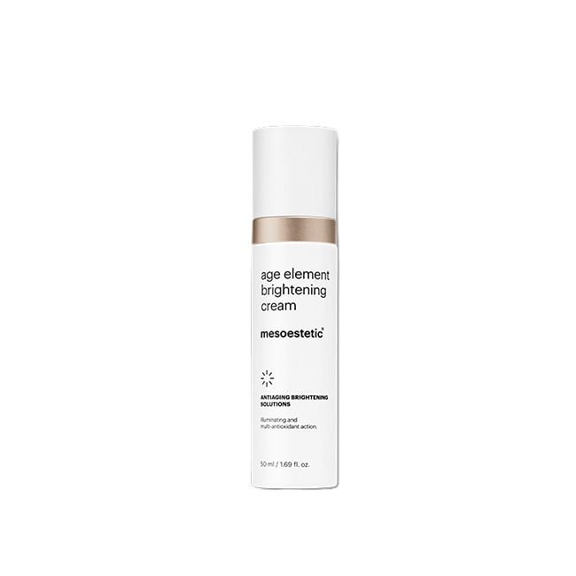 A white cylindrical cosmetic bottle of mesoesthetic Age Element Brightening Cream with a metallic gold band and black text, centered on a plain white background.