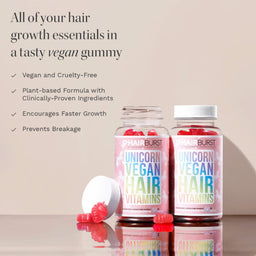 Two bottles of Hairburst Unicorn Vegan Hair Vitamins with red gummy vitamins displayed on a reflective surface against a beige background with promotional text.