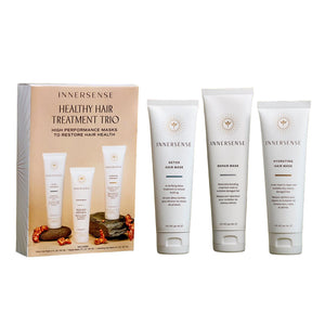 INNERSENSE Healthy Hair Treatment Trio on a green background