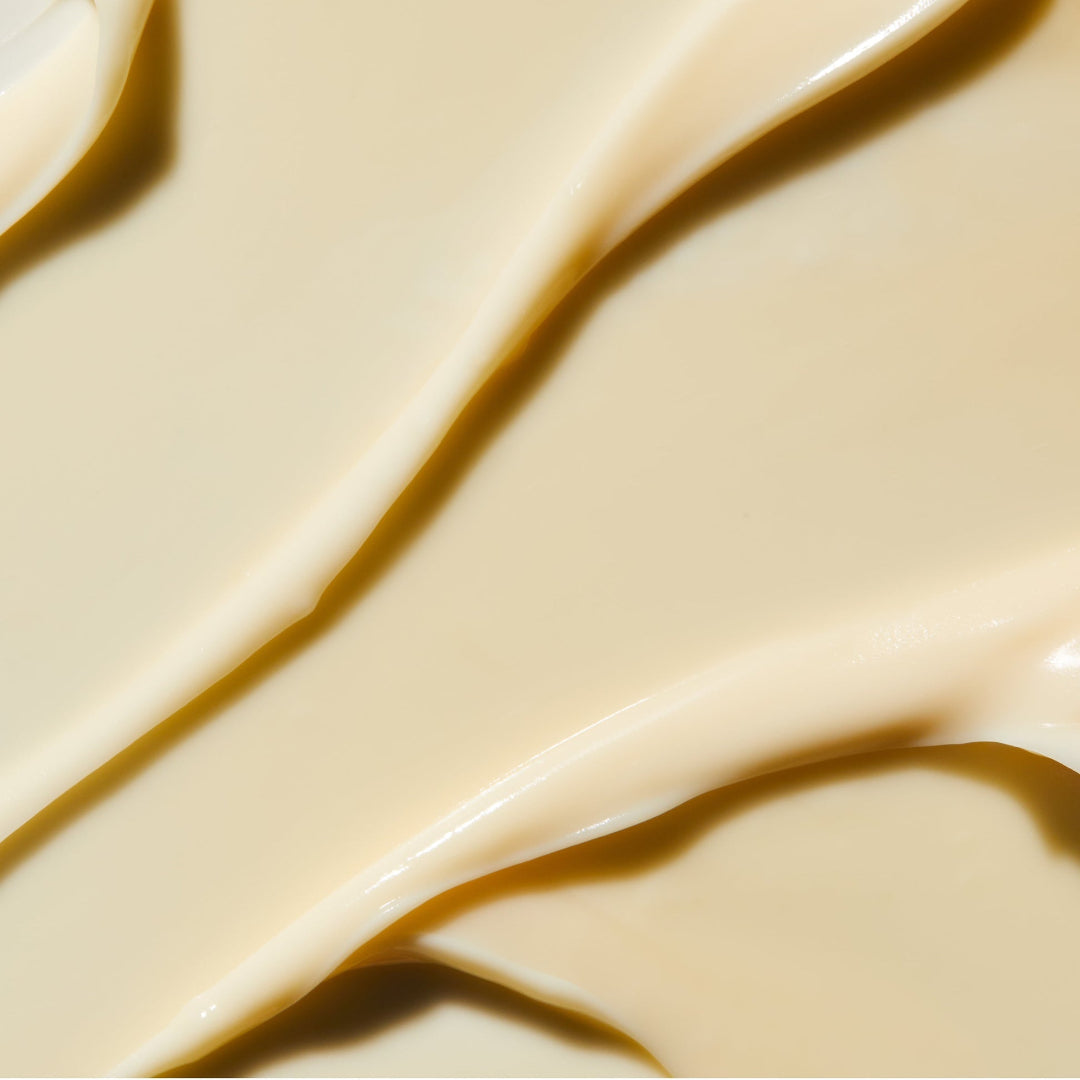 Close-up of smooth, beige cream with a glossy finish