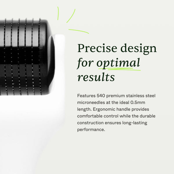 Close-up of a black cylindrical product component with fine ridges and text reading 'Precise design for optimal results' and additional feature copy about 540 premium stainless steel microneedles on a light gray background.