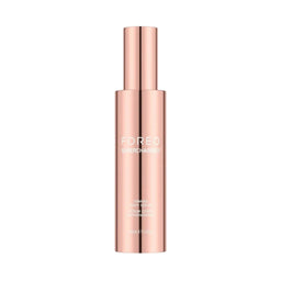 A sleek, metallic rose gold cosmetic bottle with a matching cylindrical cap, featuring the brand name 'FOREO' and product name 'EAR PIERCING' printed in white on the front, set against a solid off-white background.