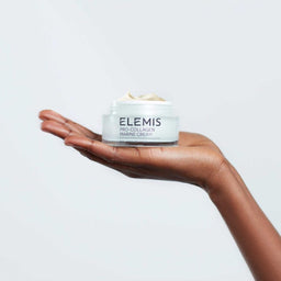 Elemis Pro Collagen Marine Cream held in the palm of a hand