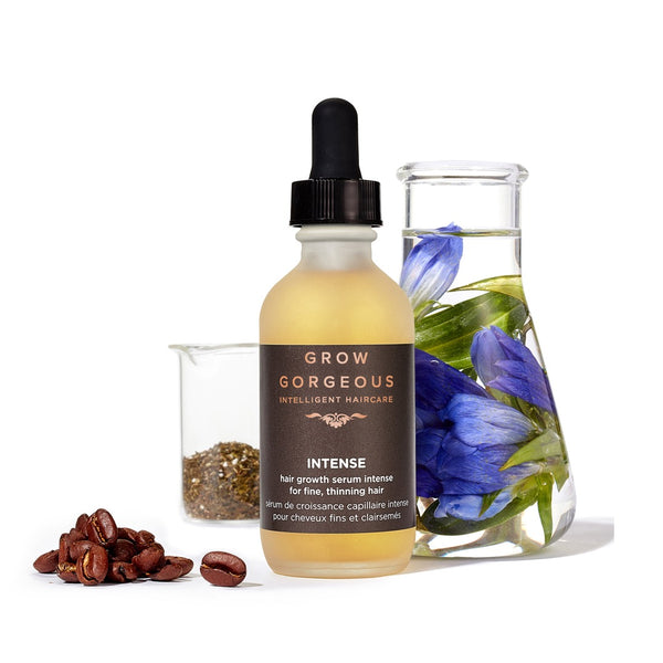 Grow Gorgeous Hair Growth Serum Intense with a pile of coffee beans and petals next to the bottle