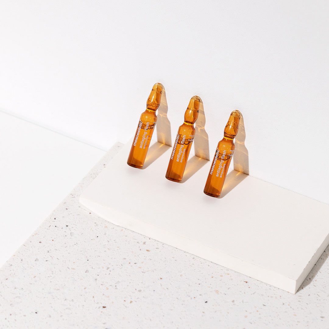 Three vial perched against a wall