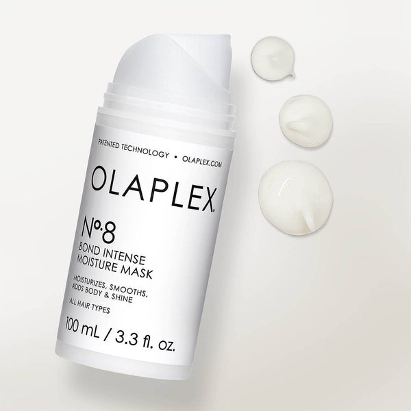 Olaplex No.8 Bond Intense Moisture Mask with three droplets of serum next to it
