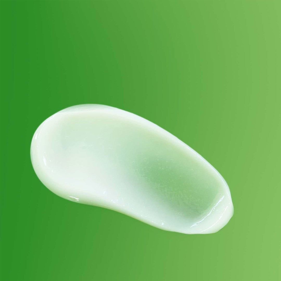 Cetaphil Moisturising Lotion poured onto a green surface