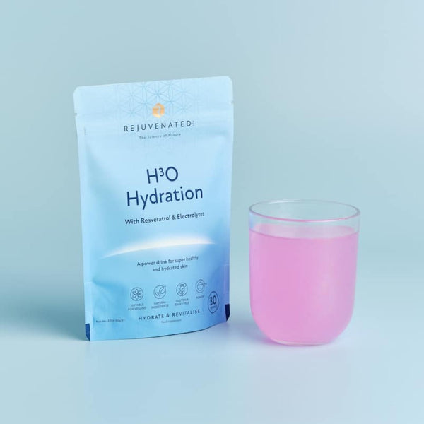 Rejuvenated H3O Hydration 60g packet with a cup