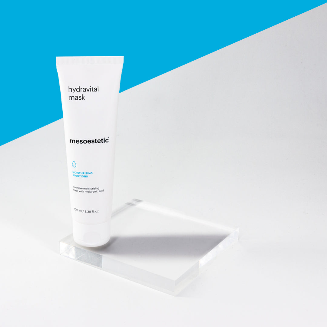 mesoestetic Hydravital Mask on a glass slate with a blue background 